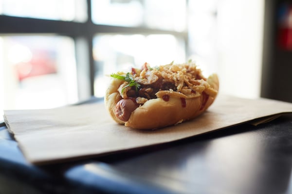 hot dog with toppings